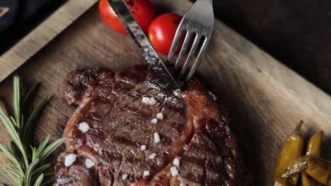 slicing a perfectly grilled steak