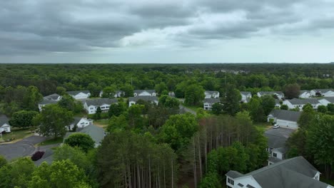 thick storm clouds over a suburban area