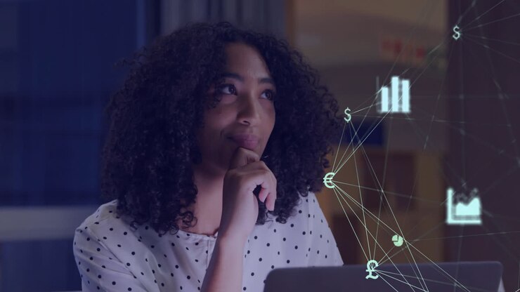 Animation of network of connections with icons over african american businesswoman using laptop