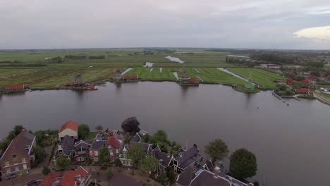 aerial view of dutch village with windmills