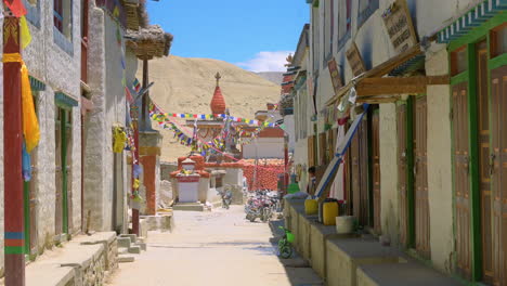 an alley of lomanthang upper mustang nepal which has an ancient stupa in center where the people of buddhist religion resides