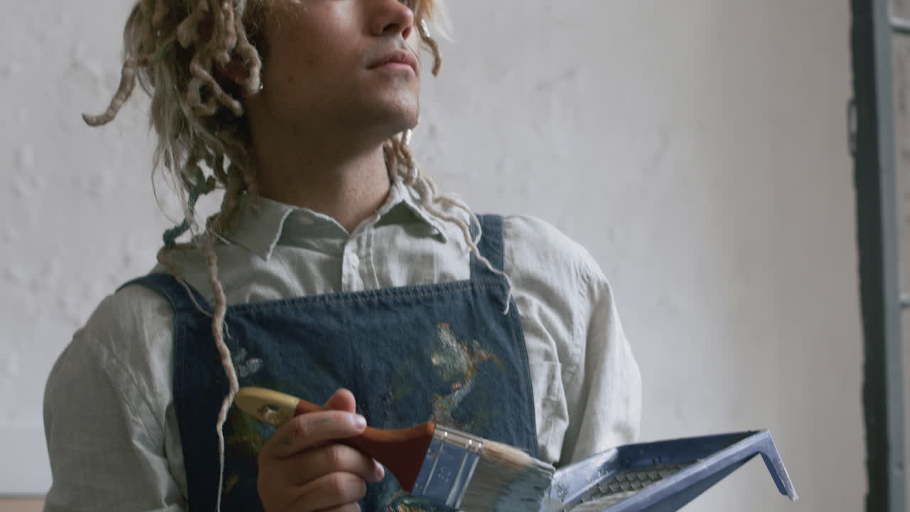 Artist painting indoors