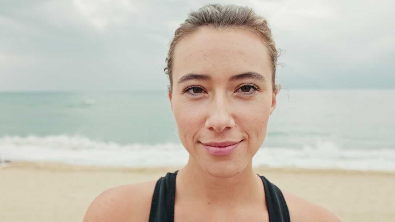 Sporty Woman Smiles After Beach Workout