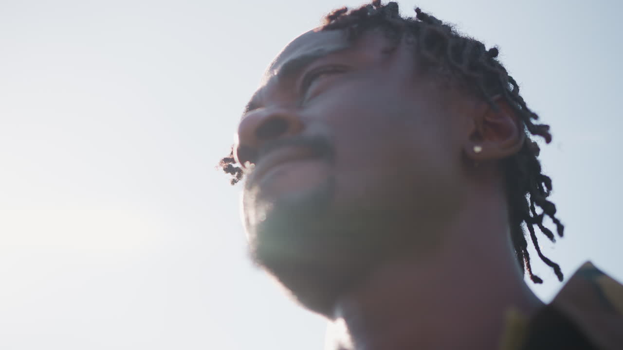 Heroic Soldier Imagery, Vivid Depiction Of Soldier With Optimistic Expression And Dramatic Lighting, Dynamic Image Showcasing Brave Warrior In Camouflage Under Bright Sky With Sun Flare