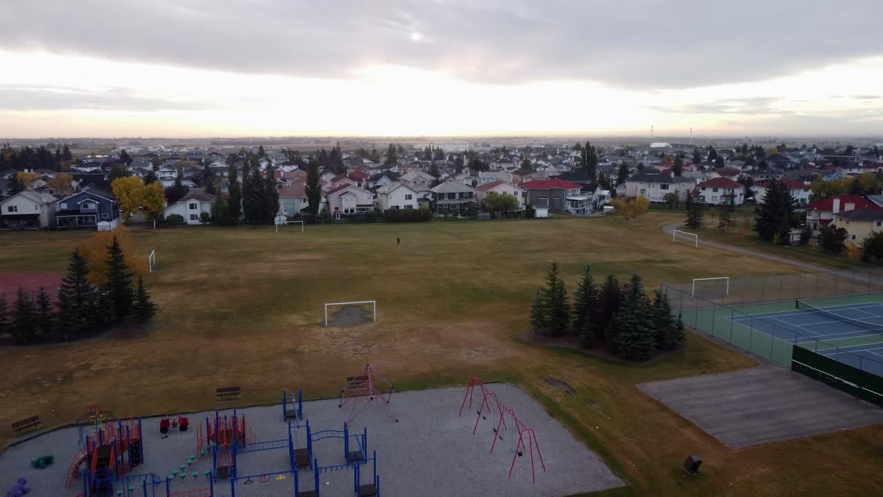 Playground neighbourhood Man on soccer field playing golf