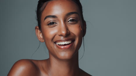 woman with makeup smiling