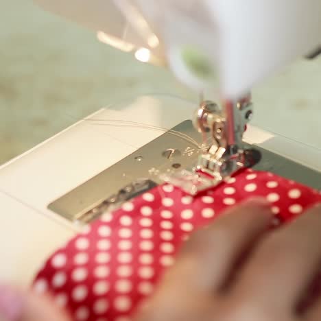 dressmaker woman sews clothes