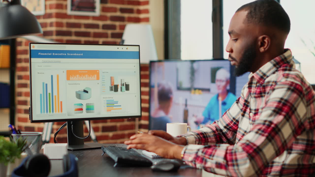 Man analyzing financial data on computer