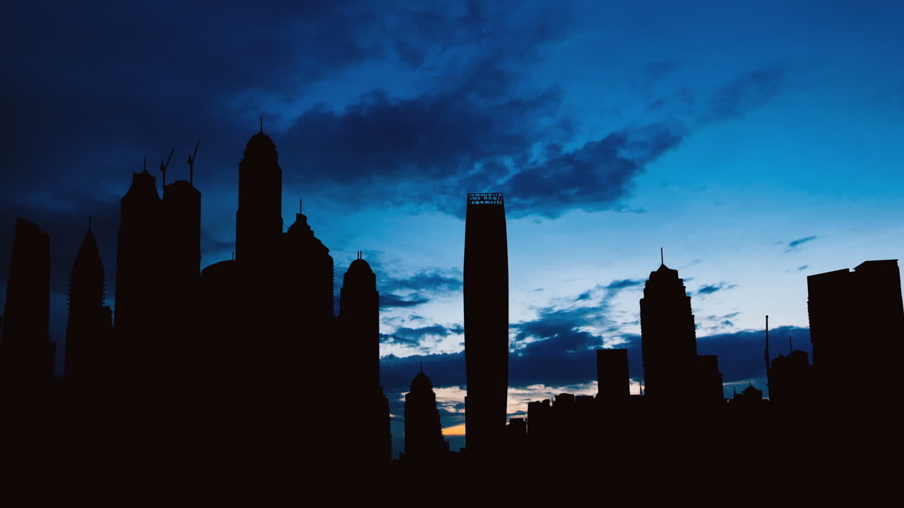 Silhouette of a Modern City Skyline at Dusk