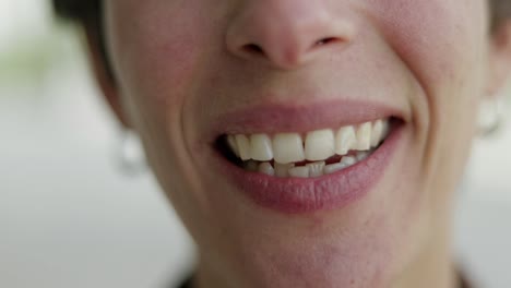 cropped shot of woman smiling at camera