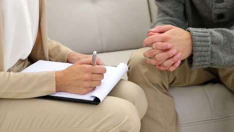 young man talking with his therapist