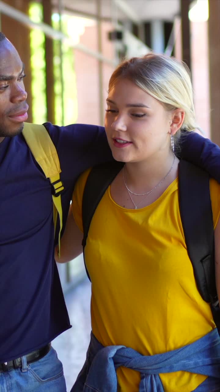 College students walking and talking on campus