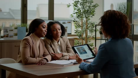 professional business meeting with tablet presentation