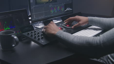person working on a digital editing workstation