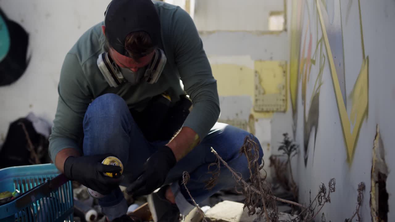 Graffiti artist putting nozzle on aerosol can 4k