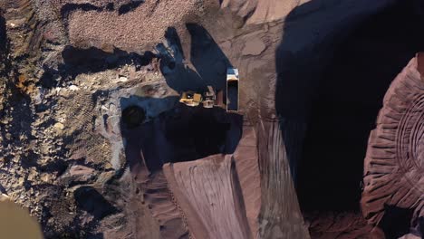 trucks loading sand in a sand quarry