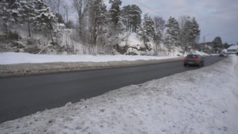 Vehicles-Driving-On-The-Winter-Road---drone-ascending