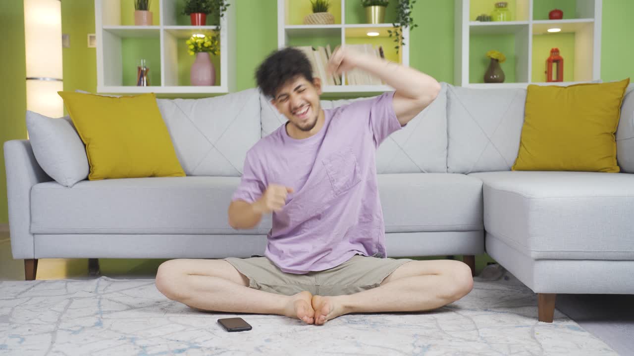 Fun young man dancing.