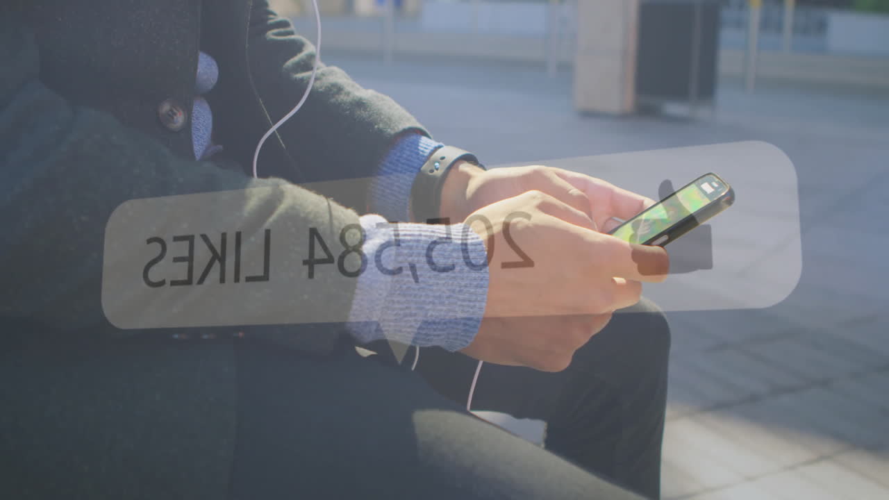 Person using smartphone with animation showing 195030 LIKES over screen