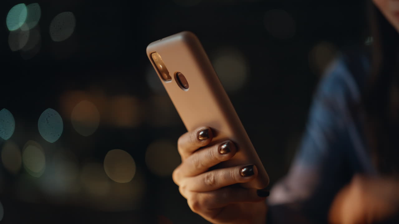 Lady hands shopping cellphone app at night home closeup. Unrecognizable woman