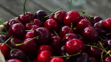 Cherries.-Cherry.-Cherries-in-color-bowl-and-kitchen-napkin.-Red-cherry.-Fresh-cherries