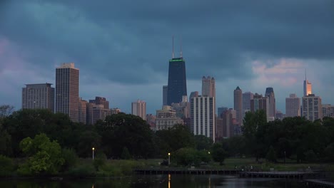time laspe day to night of chicago downtown skyline near lincoln park