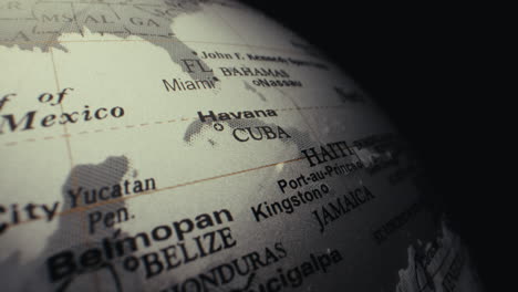 close-up of a world globe focusing on the caribbean