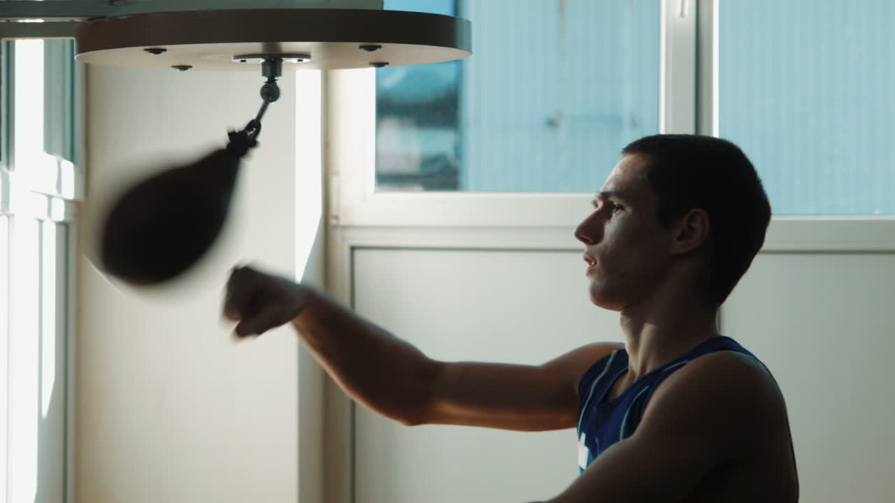 Man working out with punching bag