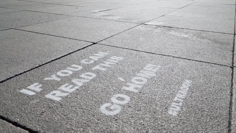 Strong-Sprayed-Message-on-Street-during-Global-Corona-Crisis-in-Europe