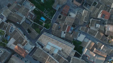 Aerial-view-of-Modica-Alta-Val-di-Noto-Sicily-Old-Baroque-Town-Rooftops-South-Italy