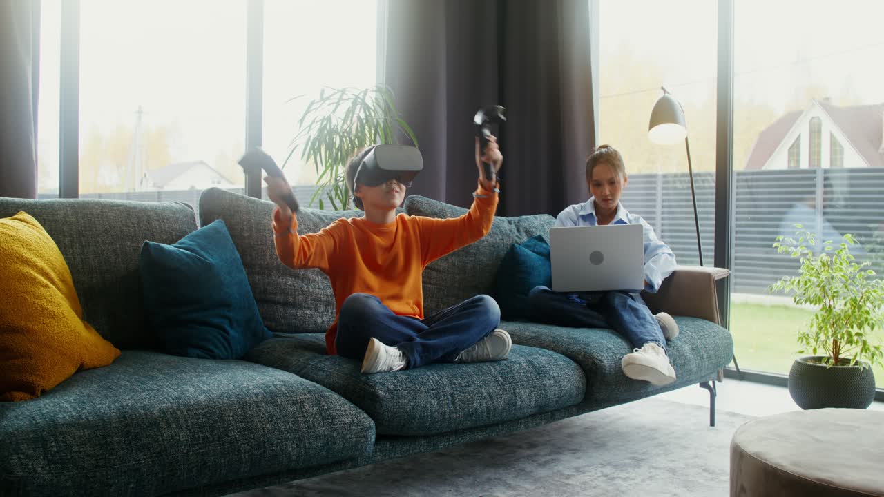 Children Using VR Headset and Laptop at Home