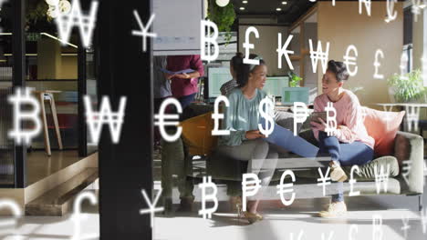 animation of currency symbols and data processing over diverse business people in office