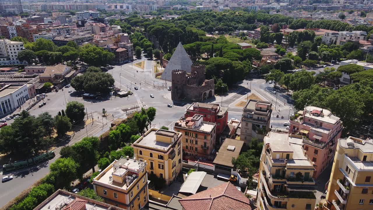 Ancient Roman pyramid rises among modern homes and lively streets, central Rome