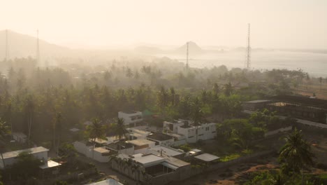 hazy sunrise in kuta lombok, indonesia. aerial shot