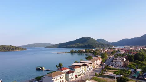 Aerial-view-of-the-port-of-the-coastal-town-of-Nidri-in-the-eastern-coast-of-the-island-of-Lefkada,-Greece