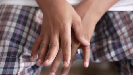 close-up of clasped hands