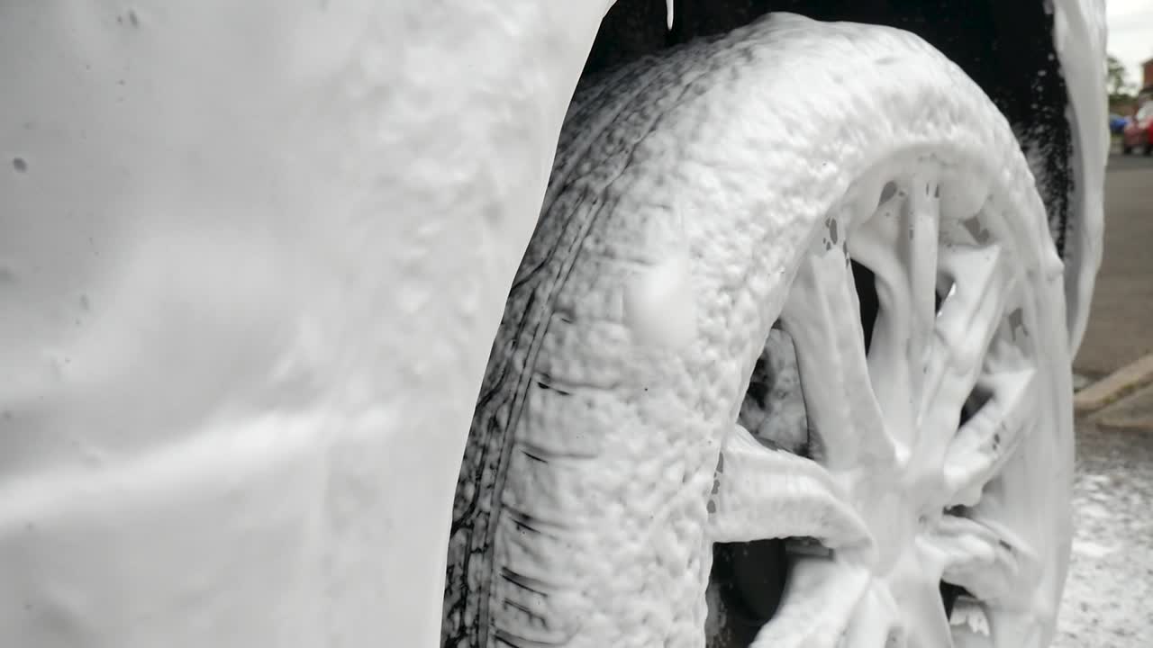 Close up of snow foam over wheel
