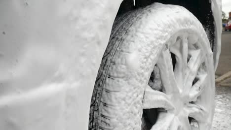 close up of snow foam over wheel