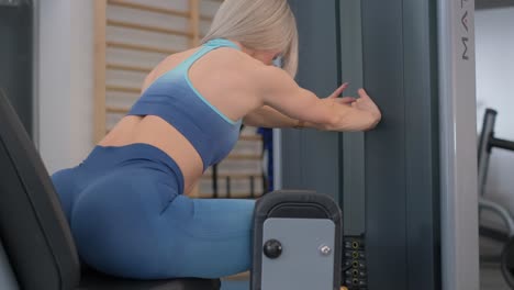 woman exercising on leg press machine