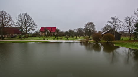 snow melting near private lake estate, fusion time lapse