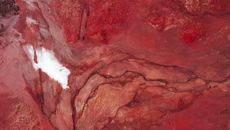 red soil in geothermal area - scenic view in reykjanes peninsula, south iceland - drone shot