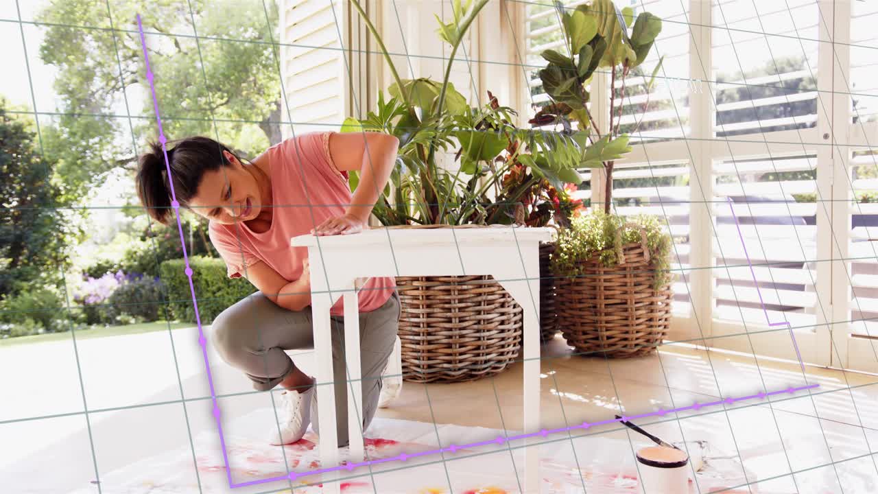 Mature woman spotting paint spill, cleaning table on porch, purple overlay sweeping over woman DIY