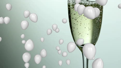 bubbles rising over champagne glass with sparkling wine