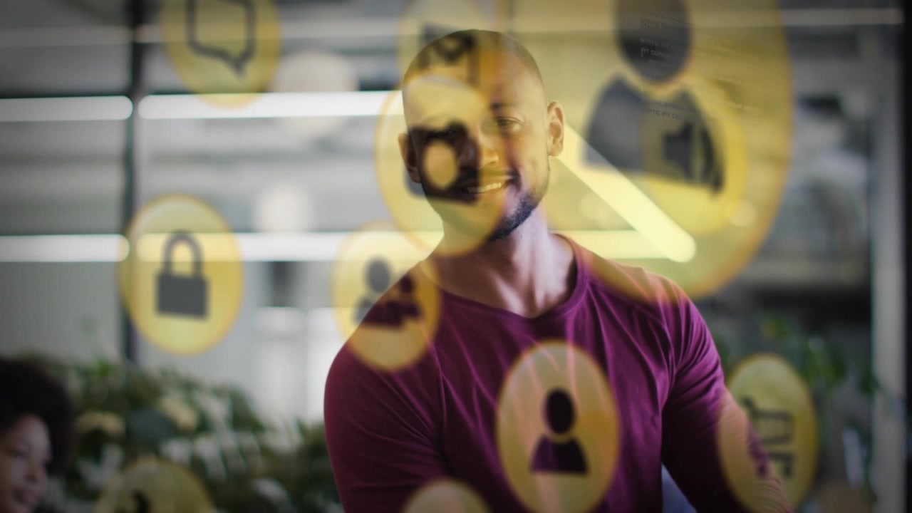Male pro tapping smartphone in office generating clear tech icons for app functions