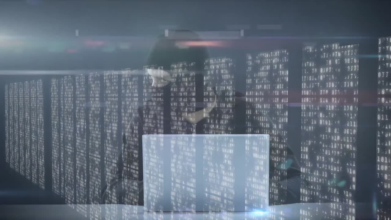 Animation of man with a mask hacking computers