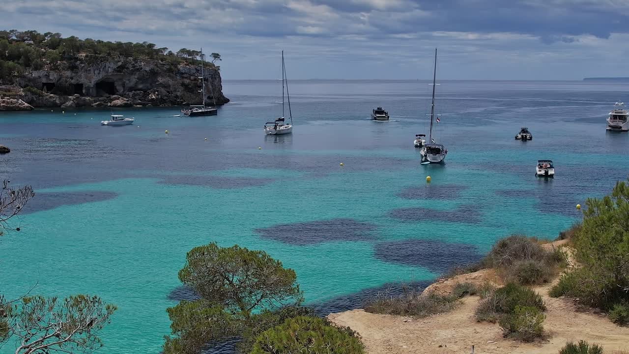 Bays and boats near the coast of Mallorca in Spain during daytime