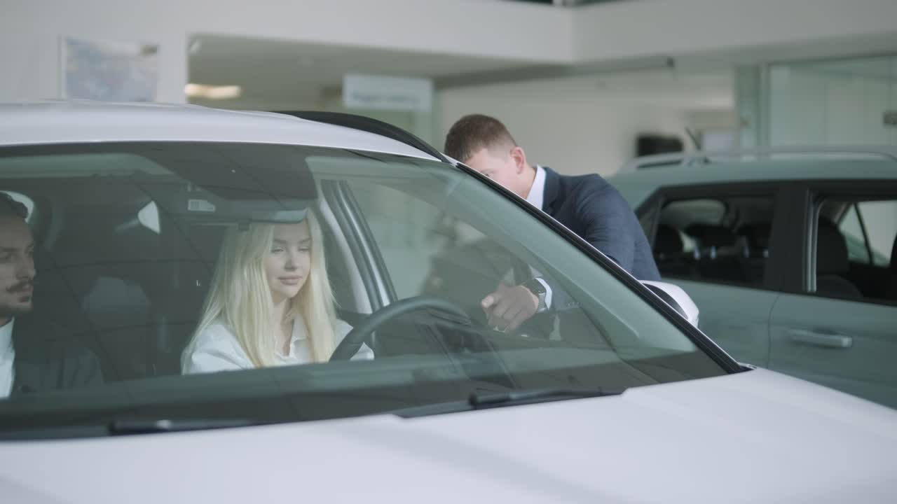 Woman Buying Car at Dealership