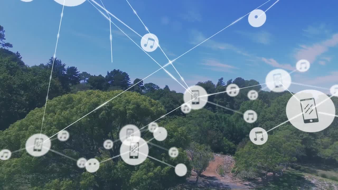 雲の空に照らされた緑の畑の木の空中景色の上に線で接続されたアイコンのアニメーション