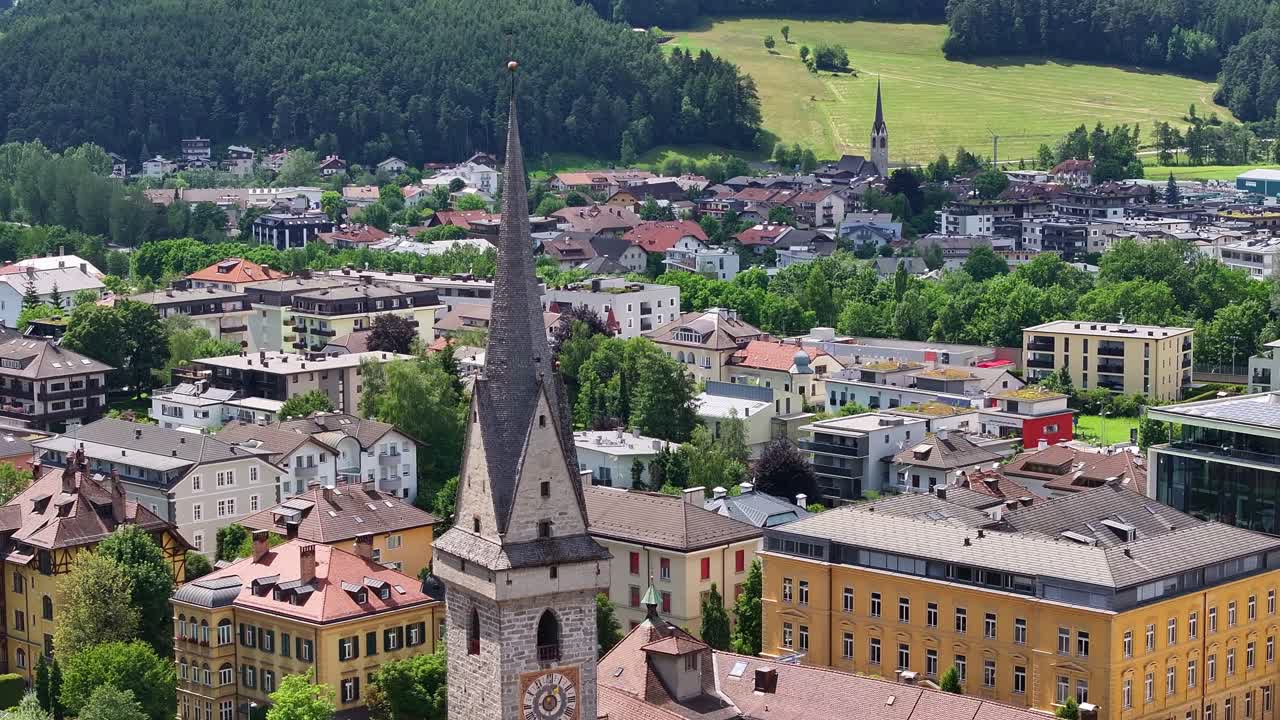 Aerial View of a European Town Nestled in the Mountains