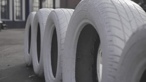 Old-white-painted-tyres